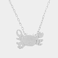 Textured matte metal crab pendant necklace